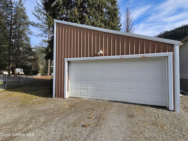 detached garage with fence