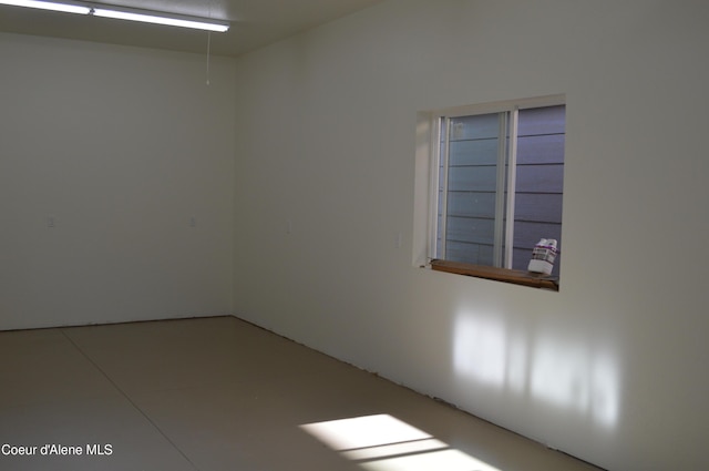 6489 E Kyong, Post Falls, ID 83854 - spare room featuring light tile patterned floors