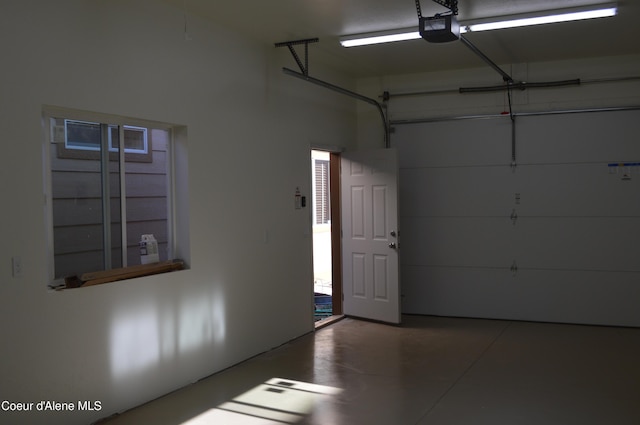 6489 E Kyong, Post Falls, ID 83854 - garage featuring a garage door opener