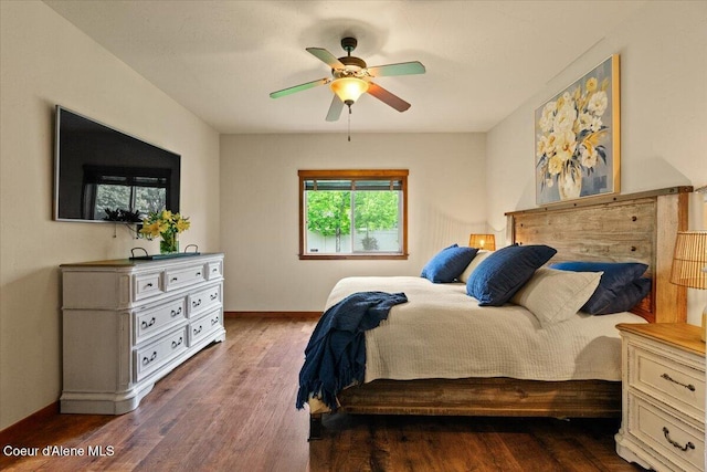 6489 E Kyong, Post Falls, ID 83854 - bedroom featuring wood finished floors, baseboards, and a ceiling fan