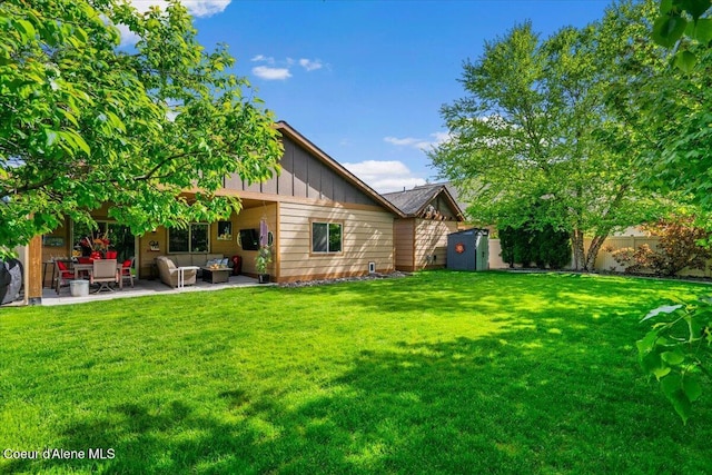 6489 E Kyong, Post Falls, ID 83854 - view of yard with outdoor lounge area and a patio area