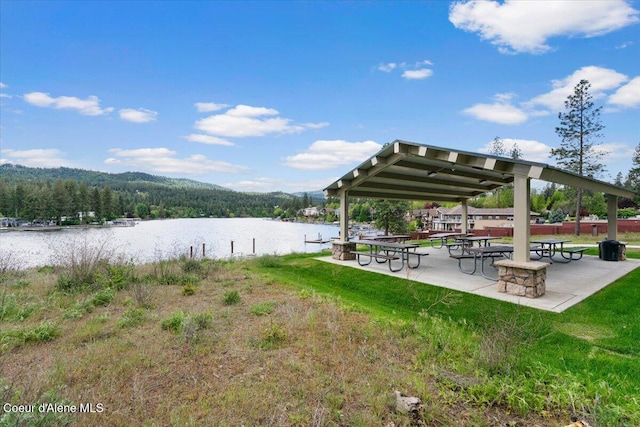 6489 E Kyong, Post Falls, ID 83854 - view of property's community featuring a water view and a wooded view