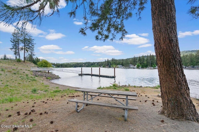6489 E Kyong, Post Falls, ID 83854 - dock featuring a water view and a view of trees