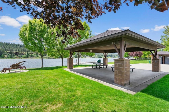 6489 E Kyong, Post Falls, ID 83854 - view of community with a gazebo, a water view, and a yard