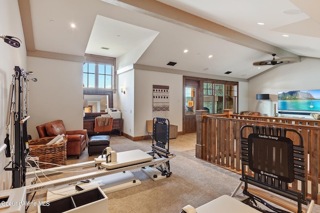 living area featuring vaulted ceiling with beams, visible vents, light carpet, ceiling fan, and baseboards