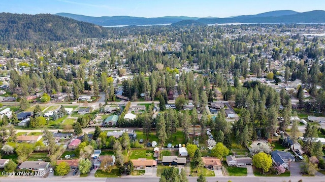 birds eye view of property featuring a mountain view