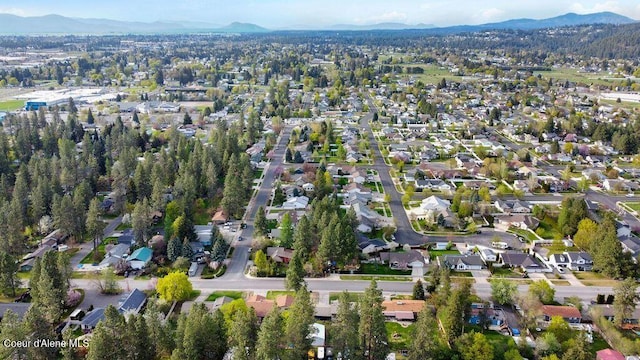 drone / aerial view featuring a mountain view and a residential view