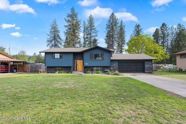 bi-level home featuring stone siding, a garage, a front lawn, and fence