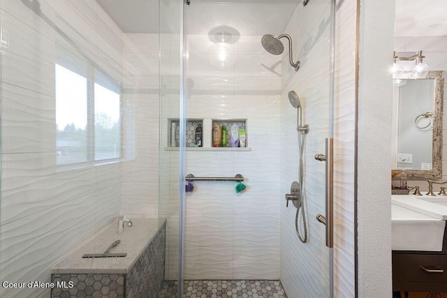 bathroom with vanity and a shower stall