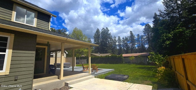 505 S Shore Pines Rd, Post Falls, ID 83854 - view of yard with a patio area and a sunroom
