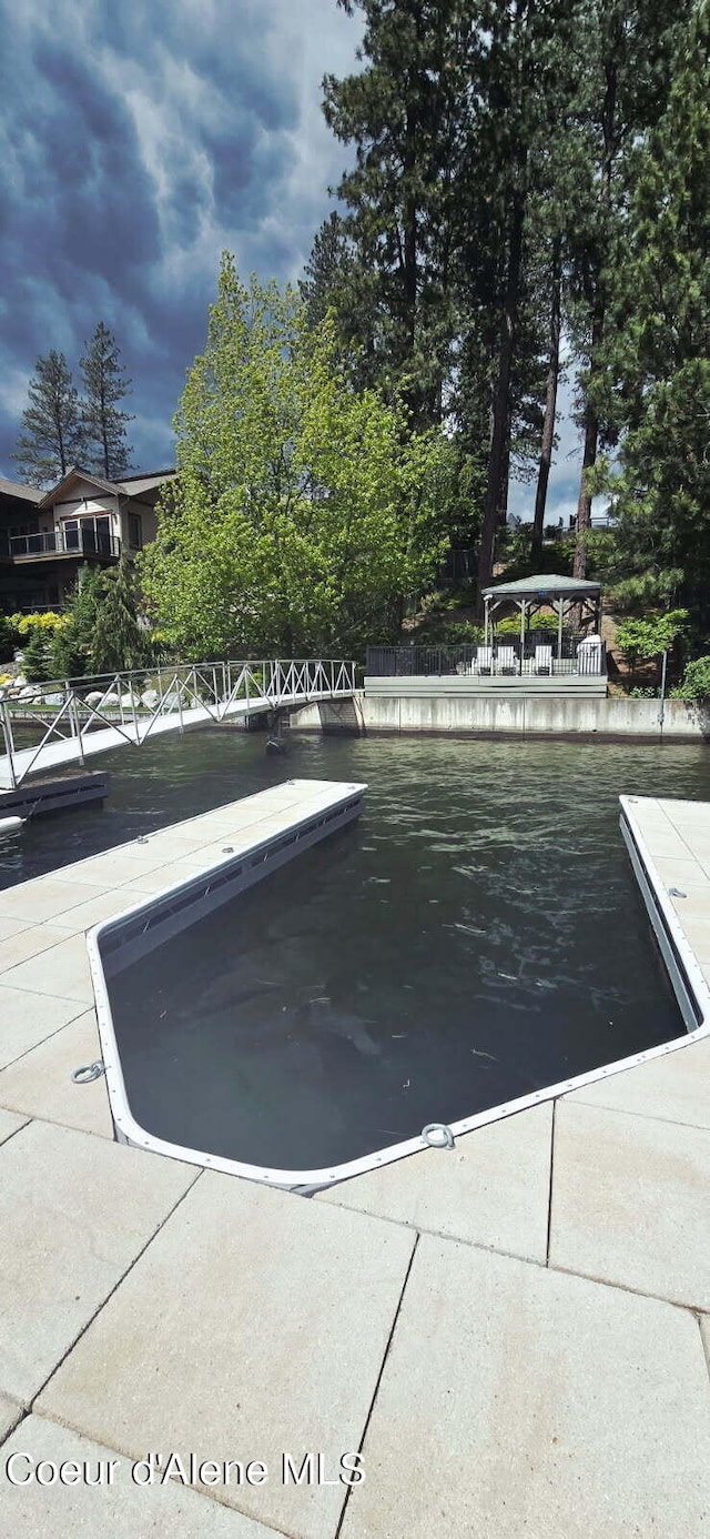 505 S Shore Pines Rd, Post Falls, ID 83854 - view of swimming pool with a boat dock