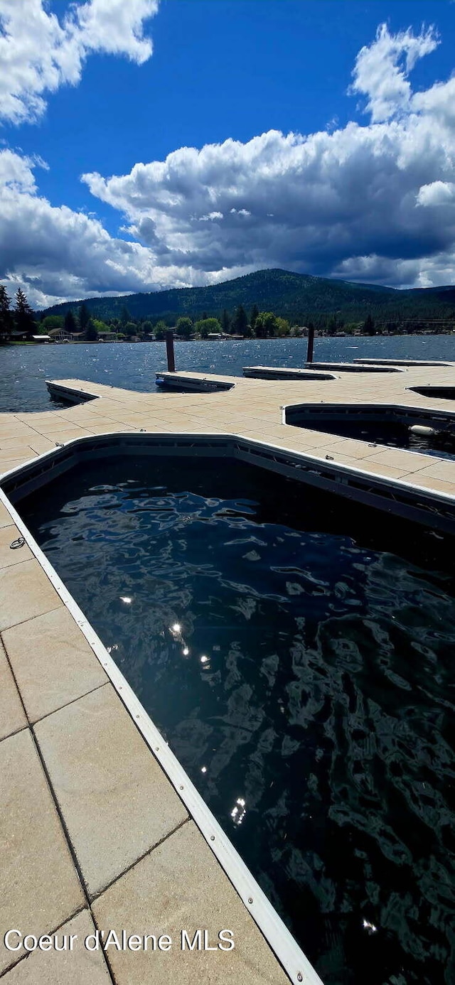 505 S Shore Pines Rd, Post Falls, ID 83854 - view of swimming pool featuring a water view