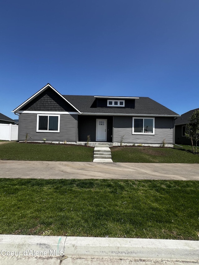 11557 N Railway Ave, Rathdrum, ID 83858 - view of front of home featuring a front lawn and roof with shingles
