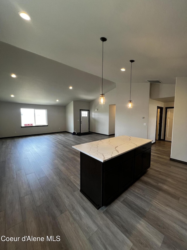 11557 N Railway Ave, Rathdrum, ID 83858 - kitchen with plenty of natural light, dark wood-style flooring, a center island, and recessed lighting