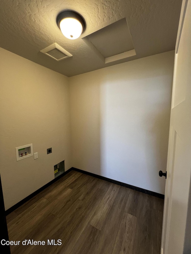 11557 N Railway Ave, Rathdrum, ID 83858 - washroom featuring attic access, hookup for an electric dryer, a textured ceiling, hookup for a washing machine, and dark wood-style floors