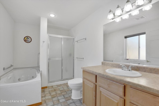 bathroom featuring a stall shower, visible vents, toilet, a whirlpool tub, and vanity