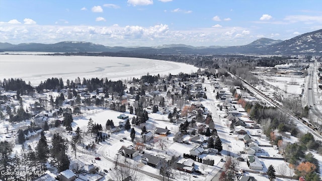 bird's eye view featuring a water and mountain view