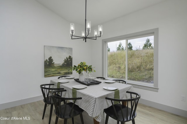 4550 E Savea Ln, Post Falls, ID 83854 - dining area featuring a chandelier and light wood finished floors