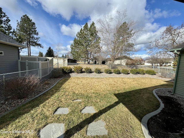 view of yard featuring a fenced backyard