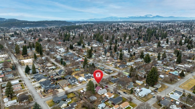 birds eye view of property featuring a residential view and a mountain view