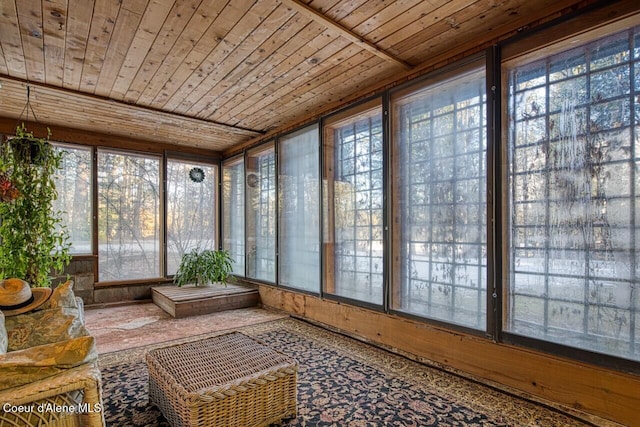 sunroom featuring wooden ceiling