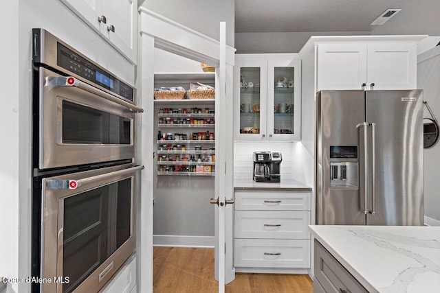 pantry with visible vents