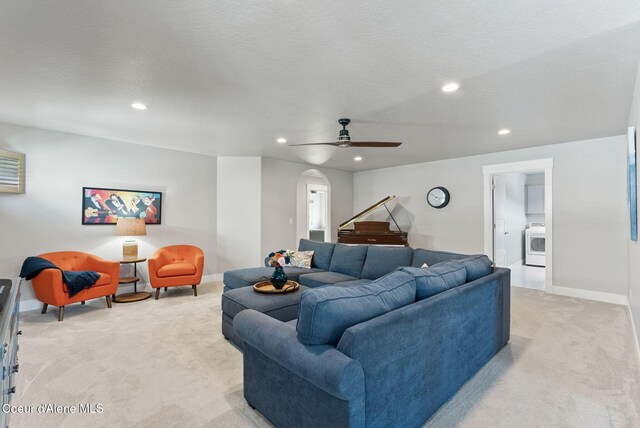 1841 W Felton Dr, Coeur Dalene, ID 83814 - living area featuring light colored carpet, recessed lighting, baseboards, and arched walkways