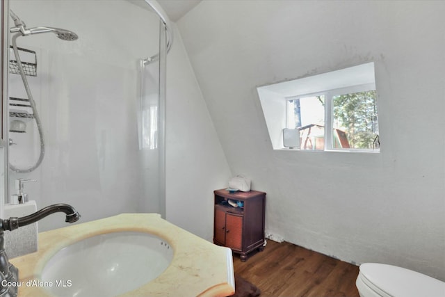 full bathroom with vanity, wood finished floors, walk in shower, and toilet