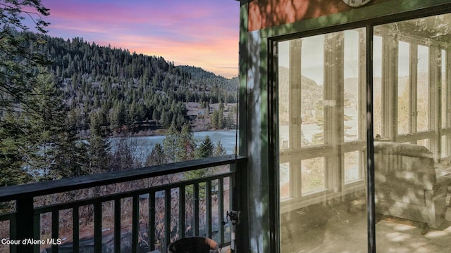 view of balcony at dusk