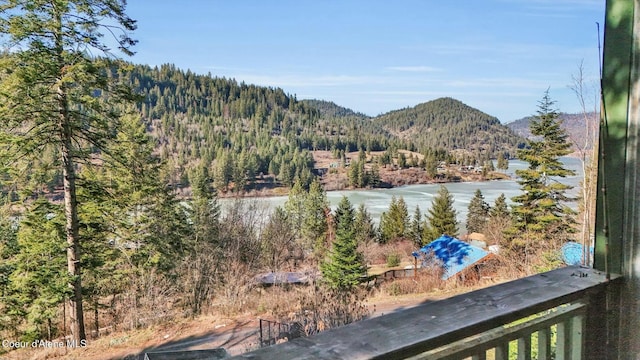 mountain view featuring a water view and a wooded view