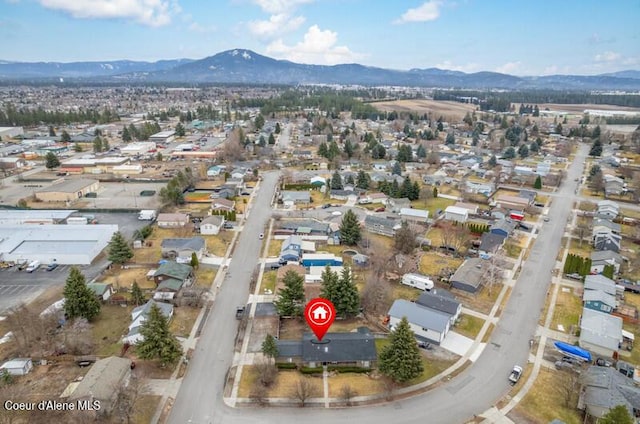 bird's eye view featuring a residential view and a mountain view