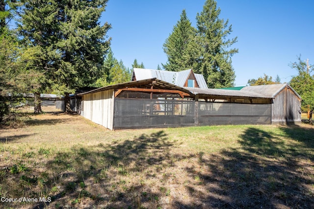exterior space with an outbuilding
