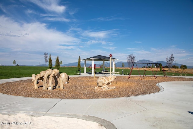 community playground featuring a mountain view