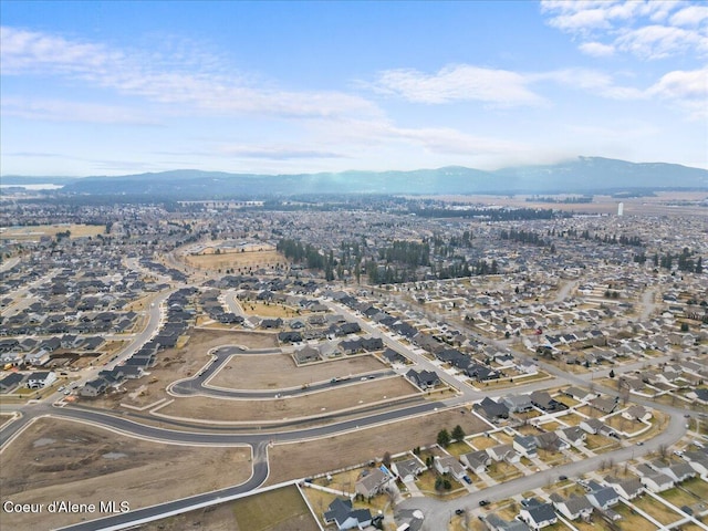 drone / aerial view featuring a mountain view