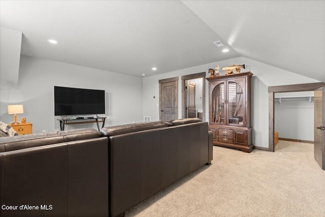 living room with light carpet, baseboards, visible vents, vaulted ceiling, and recessed lighting