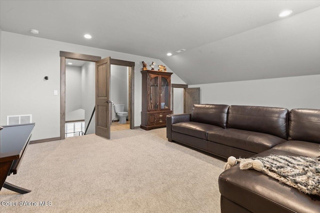 living area with lofted ceiling, recessed lighting, visible vents, and light colored carpet