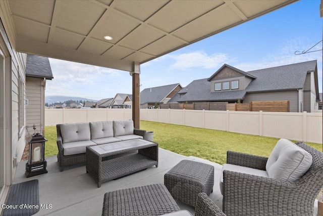 view of patio with a fenced backyard and an outdoor hangout area