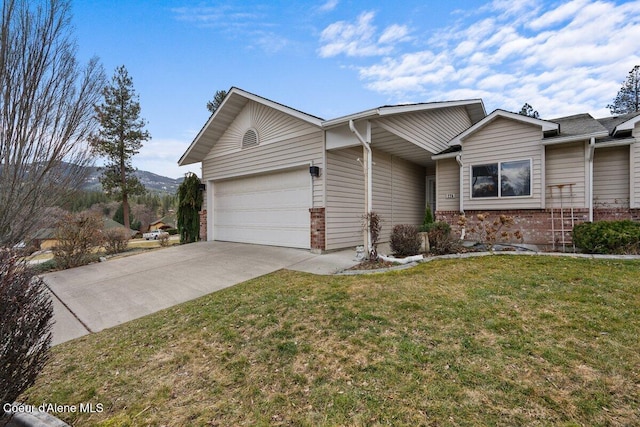 single story home with a garage, concrete driveway, a front lawn, and brick siding