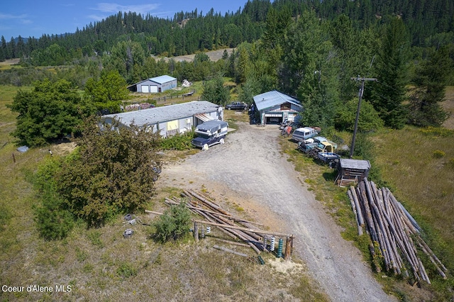 bird's eye view featuring a view of trees