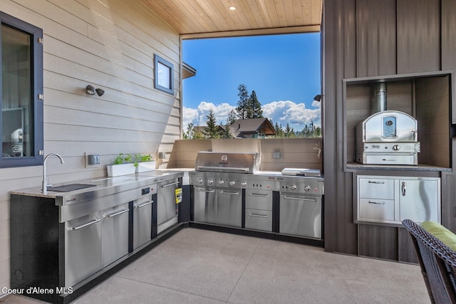 2766 S Helen Dr, Coeur Dalene, ID 83814 - view of patio / terrace featuring exterior kitchen, a sink, and grilling area