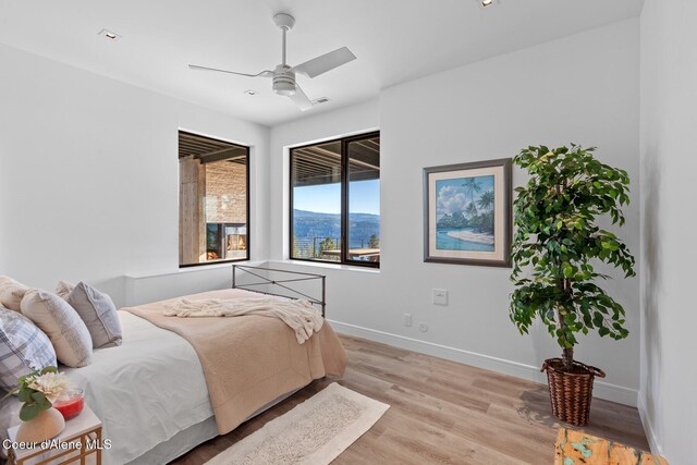 2766 S Helen Dr, Coeur Dalene, ID 83814 - bedroom with a ceiling fan, visible vents, light wood-style flooring, and baseboards