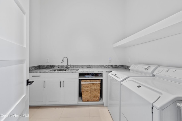 2766 S Helen Dr, Coeur Dalene, ID 83814 - washroom featuring cabinet space, light tile patterned flooring, a sink, and washing machine and clothes dryer