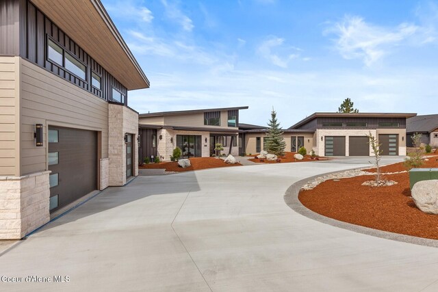2766 S Helen Dr, Coeur Dalene, ID 83814 - view of property's community with driveway and a garage