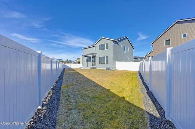 view of yard featuring a fenced backyard