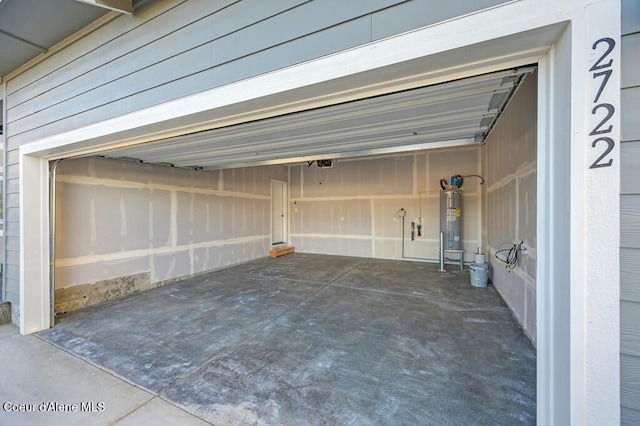 garage with electric water heater