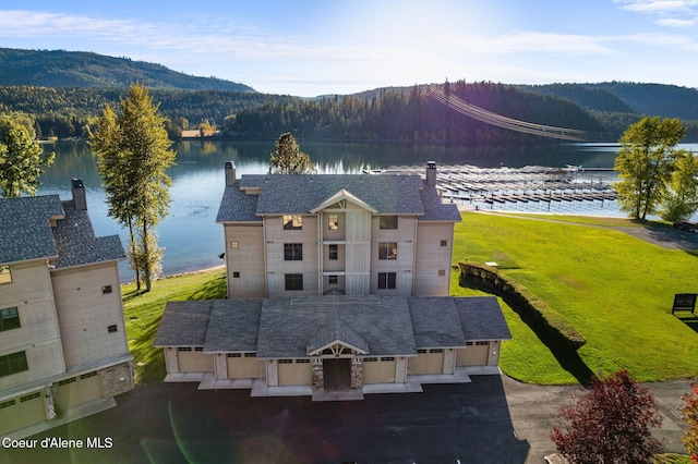 bird's eye view with a water view