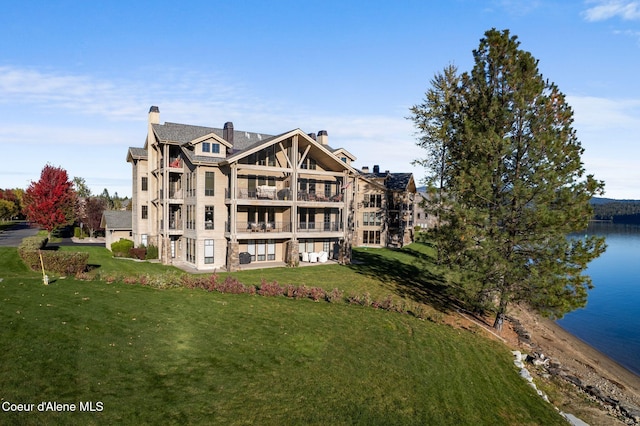 view of property with a water view