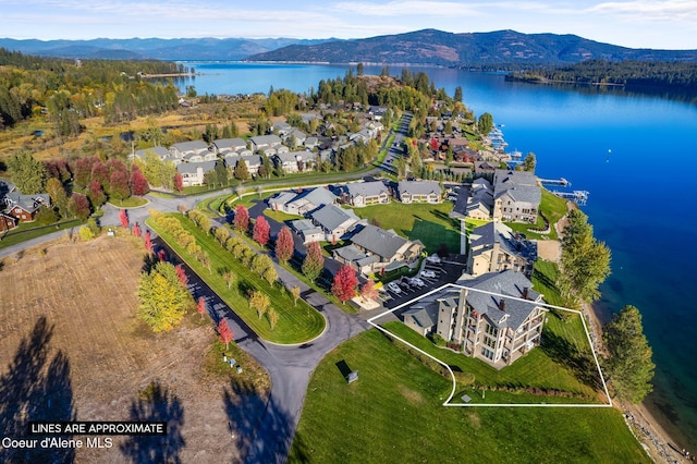 aerial view with a residential view and a water and mountain view