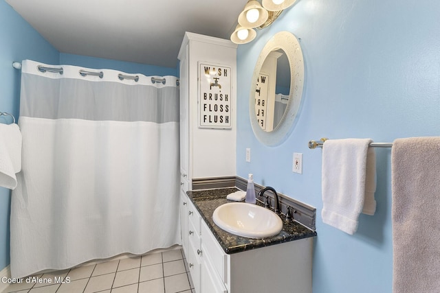 full bathroom with tile patterned flooring, vanity, and a shower with curtain