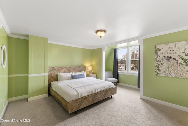 carpeted bedroom featuring baseboards and crown molding